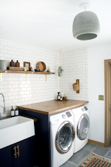 Concrete light that ties in with the floor tile.