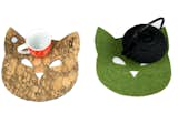 A set of two trivets Cat & Dog.  
Part of a collection "Cork & Felt" of accessories and life style items. Fun, useful irresistible are designed and produced in Rome, in Italy.
From fun and functional form these trivet is made unique by the innovative and ecological material created by designer, composed of composite cork with felt. The set consists of two pieces; Resists heat; Soft inside and impact resistant; Washable with universal degreaser outside;