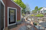 Outdoor, Stone Patio, Porch, Deck, Boulders, and Back Yard Back patio.  Photo 4 of 15 in Tavern House by Debra LaPorte Communications