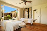 Kukui`ula Hi`ilani Spa treatment rooms featuring outdoor showers, soaking tub and pune`e (Hawaiian daybed).