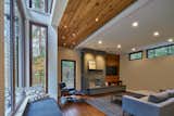Living Room, Chair, Sofa, Coffee Tables, Bench, Accent Lighting, Pendant Lighting, Ceiling Lighting, Recessed Lighting, and Medium Hardwood Floor  Photo 1 of 6 in Deer Haven Residence by Mathison I Mathison Architects
