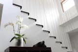 Staircase, Metal Railing, Cable Railing, Concrete Tread, and Metal Tread  Photo 9 of 13 in Extension of a house in Geneva by KELLER ARCHITECTES