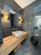 Powder room with wash bassin found on the property