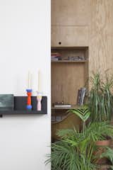 Office, Desk, Storage, Shelves, Concrete Floor, Bookcase, Study Room Type, and Chair A discreet workspace with plenty of light.  Photo 8 of 17 in Hauteville street residence by Julebourg