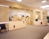 Industry: Real Estate

Location: Ventura, CA

Scope: Reception Desk and Private Offices

Materials: Stained Maple, Birch Veneer and Aluminum Inlay

Design Firm: Rasmussen & Associates