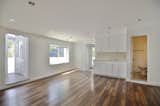 The spacious 1,740 sq ft unfurnished rental also has a large family room with surround sound and adjacent bathroom, with a covered patio footsteps away.  Perhaps it becomes an alternative primary bedroom suite? 