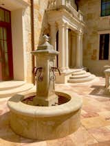 Our hand carved limestone fountains are a perfect accent for any back/courtyard. Check out our site for more info. --> 

https://pittetarch.com/fountains/central-fountain-with-floral-decor.html