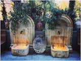 Our hand-carved fountains can be seen at one of Dallas's most popular Italian Restaurant, Dolce Riviera. Their rust appearance blends well with any design style. Check out our website for similar products. 
www.pittetarch.com