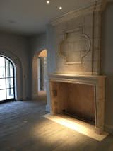 A 17th Century Limestone fireplace's with a trumeau becomes a great focal point of any living room. 
Visit our site to see our full inventory. --> 
https://pittetarch.com/antique-fireplace-mantels.html
