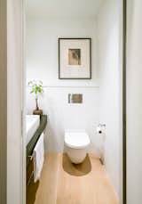 Bathroom, Light Hardwood Floors, Concrete Counters, Vessel Sinks, One Piece Toilets 
