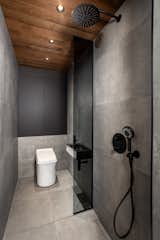 A bathroom with shower and an ecological Cinderella dry toilet