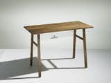Solid walnut.  Designed and produced in Seattle