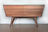 If we may boast, this takes the cake as the favorite product that we produce.  Intriguing angles, clean lines, gorgeous materials.   Designed and built in Seattle by CornerMade, this modern take on a credenza is made from 100% domestic wood with real walnut facing and solid walnut legs.