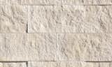Blend modern and traditional with this large-faced stone that masterfully combines medium rocky texture, monochromatic colors and a cut that’s perfect for stacking tight or as a contrasting band against smoother profiles. Profile shown here in Whisper White.  Photo 13 of 32 in Modern Collection by Eldorado Stone