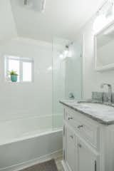 Bath Room, Marble Counter, Marble Floor, Subway Tile Wall, and Drop In Sink After - Bathroom  Photo 5 of 10 in Carriage on Capital by Toni