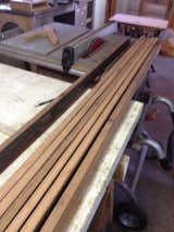 Once clean, planks were re-sawn on a table saw to get about 2 inch wide strips, then re-sawn again so that they were about a quarter inch thick.