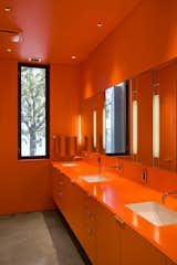 Orange livens this bathroom to the highest degree. Min Day has garnered numerous awards including the 2007 AIA California Emerging Talent award, New Practices San Francisco 2009, California Home &amp; Design’s 2009 Ten to Watch, Residential Architect’s 2010 Rising Star, Architectural Record Magazine’s 2009 Design Vanguard, and the Architectural League of New York’s 2016 Emerging Voices.  Photo 3 of 11 in These 10 Designers Are Experts at Creating Colorful Bathrooms That Pop