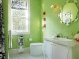 Apple Green walls and an engaging floor pattern sparkle in this design by Steven Miller.  Photo 10 of 11 in These 10 Designers Are Experts at Creating Colorful Bathrooms That Pop