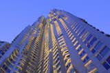 Gehry's building at 8 Spruce Street, New York, which features a rippling, undulating stainless steel facade, has become an iconic landmark that has captured both local and global attention and won critical acclaim.