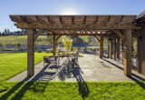 Barrel House tasting room serves as a community center for Tumwater. The Humboldt Redwood pergola creates an outdoor room that can play host to wine tastings and private events. 