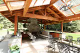 Large Humboldt Sawmill redwood timbers in sizes including 6x6, 6x10, and 6x12, form the structural elements of the pergola. 