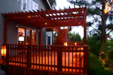 Metamorphosis Landscaping redwood deck at twilight. 