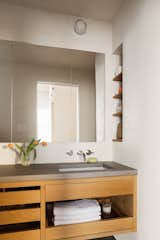 Bathroom with custom reclaimed white oak vanity and concrete vanity top