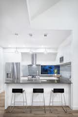 Looking to the compact kitchen from the dining area.

www.clarkrichardson.com
