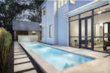 A compact lap pool tucked on the south side of the house is bounded by both the master bedroom and central screen porch.

www.clarkrichardson.com