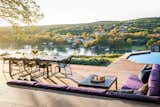 The outdoor living space is a belvedere and nothing less. A spectacular unencumbered view of the river and hills beyond is the star.