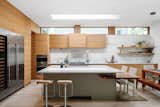 View of Kitchen and Dining Spaces: Ample Storage, Sitting and Cooking Surfaces are Provided.