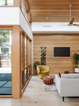 View of Living Room: Wood Finishes Give this Space a Warm and Comforting Atmosphere