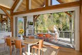Contemporary design, showcasing the flexible aesthetic of timber framing.  Photo 5 of 16 in Contemporary Timber Frame Home Overlooking Twin Waterfalls by OakBridge Timber Framing