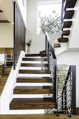 Floating Staircase-Designed to diffuse the light as it spills through the treads/railing creating a play of light inside the home
