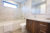 Bath, Granite, Porcelain Tile, Undermount, Drop In, Full, Ceiling, Porcelain Tile, and One Piece Bedroom  #1 Bathroom  Bath One Piece Ceiling Full Drop In Photos from The Abernathy