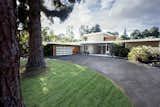 This Mid Century Modern Residence located in Pasadena was designed to have fewer interior walls and include large amounts of glass which was articulated in a classic courtyard plan. The making of this house is a continuation of the classic Mid Century Modern vocabulary which was established by the Case Study Houses and the work of residential architects like Neutra, Schindler, Soriano, and Ellwood in the Hollywood Hills of Los Angeles.