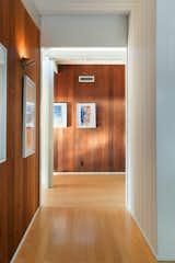 The beautifully preserved redwood-clad walls are on full display throughout the long hallway.