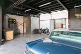 A peek at the three-car garage/workshop located on the bottom level of the main residence.