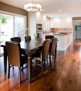 Removing a few walls allowed the kitchen, dining area, and family room to be combined into one large open space.