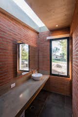 Bath Room, Concrete Counter, Ceramic Tile Floor, Vessel Sink, and Ceiling Lighting  Photos from Casa RINCÓN