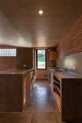 Kitchen, Ceiling, Refrigerator, Concrete, Microwave, Ceramic Tile, Wood, Drop In, and Concrete  Kitchen Drop In Wood Concrete Photos from Casa RINCÓN