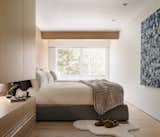 Gorgeous Bedroom with breathtaking views, warm woods, soft textures, and neutral palate.
