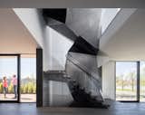 Upon entering the house and seeing the stair one questions any preconceived notions about the architecture