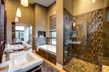 Master bathroom suite featuring Kohler fixtures and maple hardwood floors.  Photo 17 of 35 in Ascent Estes Park by Rich Chíappe