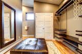 The master closet offers plenty of circulation space and natural light.
