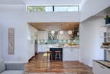 Kitchen with Clerestory Above Interlock House by Matt Fajkus Architecture