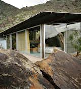 The Frey II House embedded in the rocky hillside of Palm Springs
