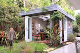 In Avalon, Australia, Olaf von Sperl and Cindy Goode Milman designed a she shed for the corner of Milman's backyard with $15,500. As an artist, she sought a space that would work as both a functional studio as well as a place of respite to enjoy the beautiful year-round weather of the area. With a roof of translucent polycarbonate panels topped with a planted green roof, this she shed is one-of-a-kind.