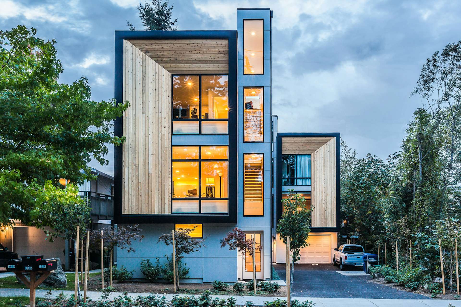 The Genesee Townhomes were constructed in Method Homes’ manufacturing facility in Ferndale, Washington. The prefabricated units were delivered as 12 nearly complete units, and then craned into place and joined together at their West Seattle site.