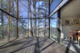 The glazed porch acts as a buffer between inside and outside.